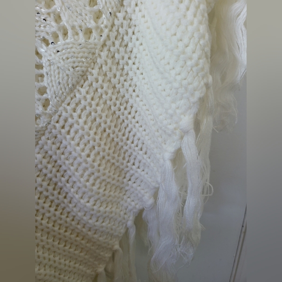 EUC! Ivory Knit Poncho with Silver sequin detail. Fits up to Size L. - Picture 5 of 5